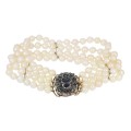 Złota bransoletka z perłami i szafirami