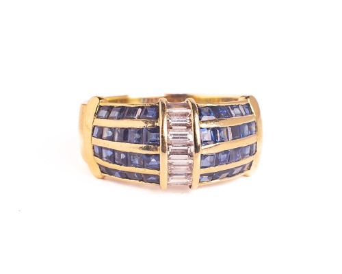 Złoty pierścionek z szafirami diamentami bagietami