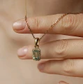 Złota zawieszka z turmalinem i diamentami