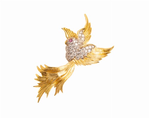 Złota broszka rajskiego ptaka