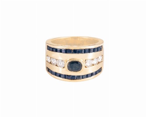 Złoty pierścionek z szeroką obrączką, z szafirami i 6 diamentami