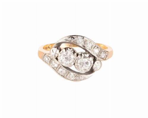 Pierścionek z 2 brylantami głównymi i 8 bocznymi diamentami