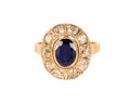 Złoty pierścionek z szafirem ok. 1,40 ct oraz diamentami dookoła