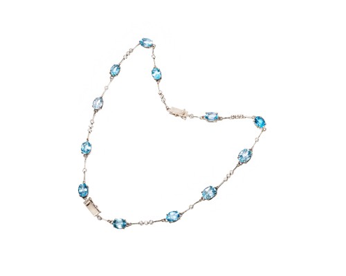 Naszyjnik złożony z dwóch bransoletek, z 12 topazami i diamentami