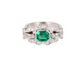 Pierścionek ze szmaragdem ok. 0,90 ct i diamentami