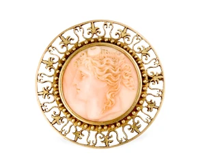 Złota, okrągła broszka z kameą